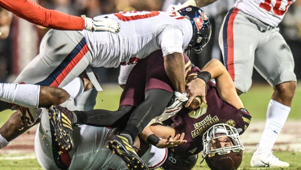 Gee whiz: Peeing dog celebration costs Ole Miss in Egg Bowl - The