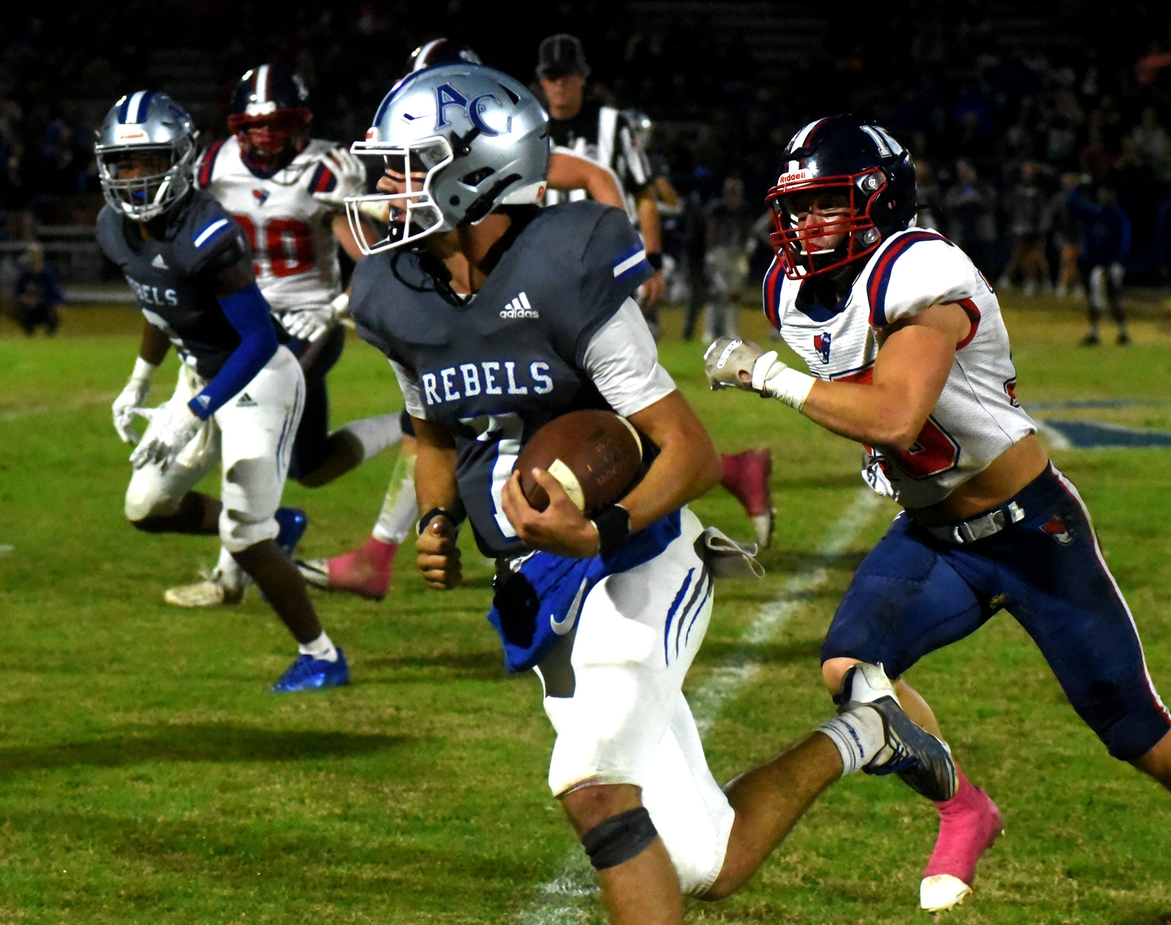 Rebels fall to Patriots to begin season 